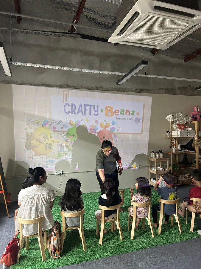 Children at a Crafty Beans presentation